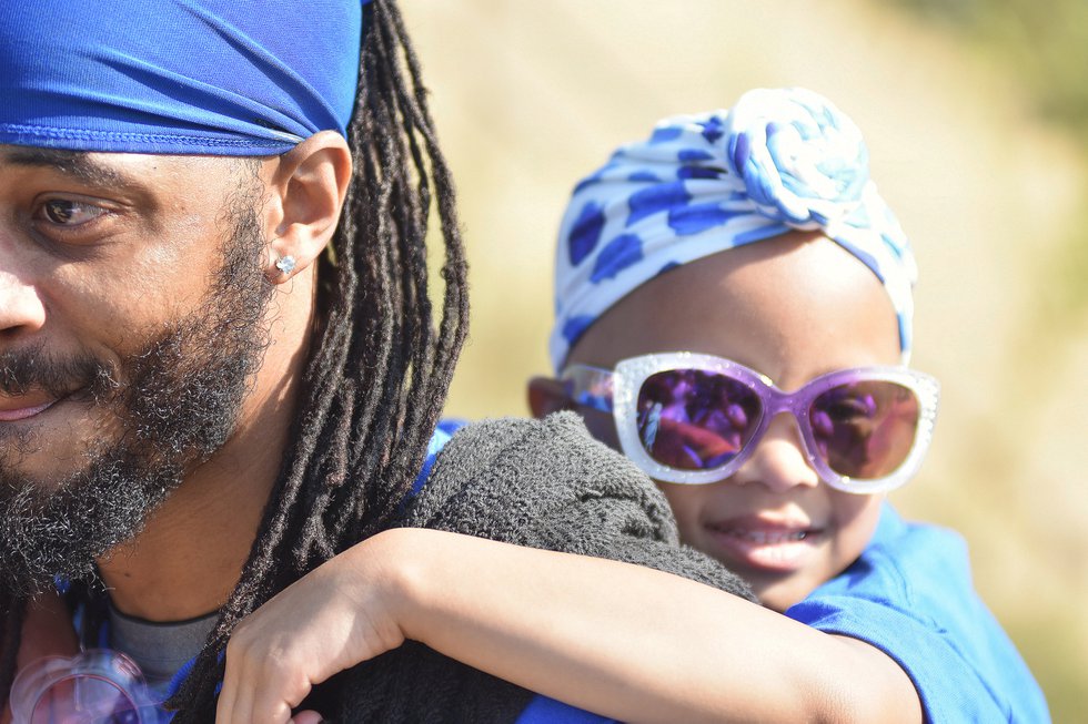 Ivan Carter with 5-year-old daughter Khoda Ivy Carter, who has alopecia.jpg