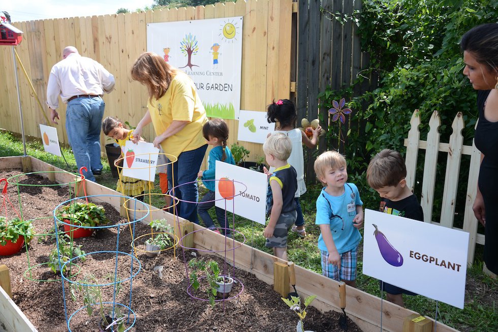 Children enjoy community garden at Rocky Ridge Learning Center ...