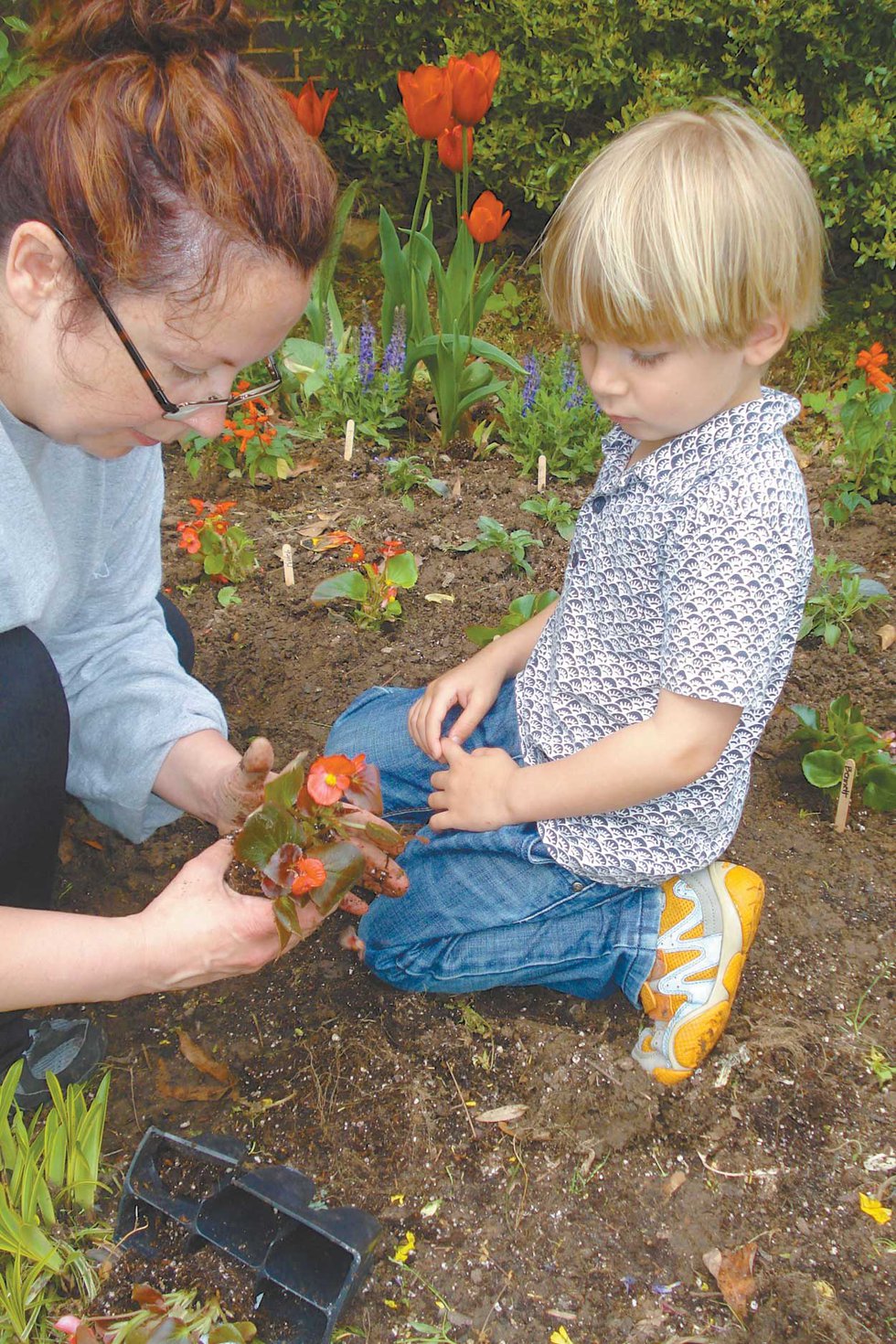 Preschooler learns about planting